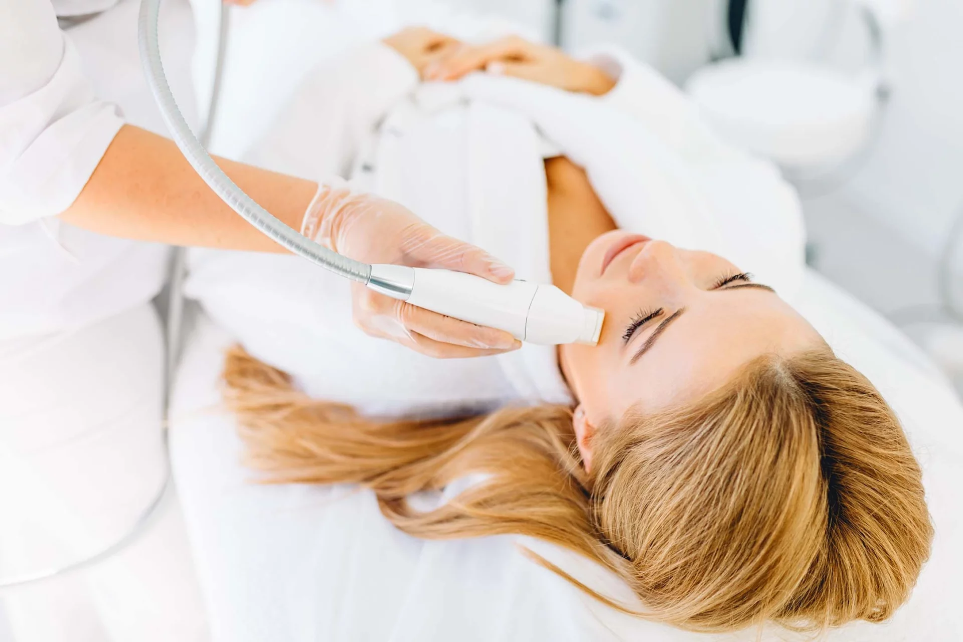 med spa patient receiving a facial laser treatment